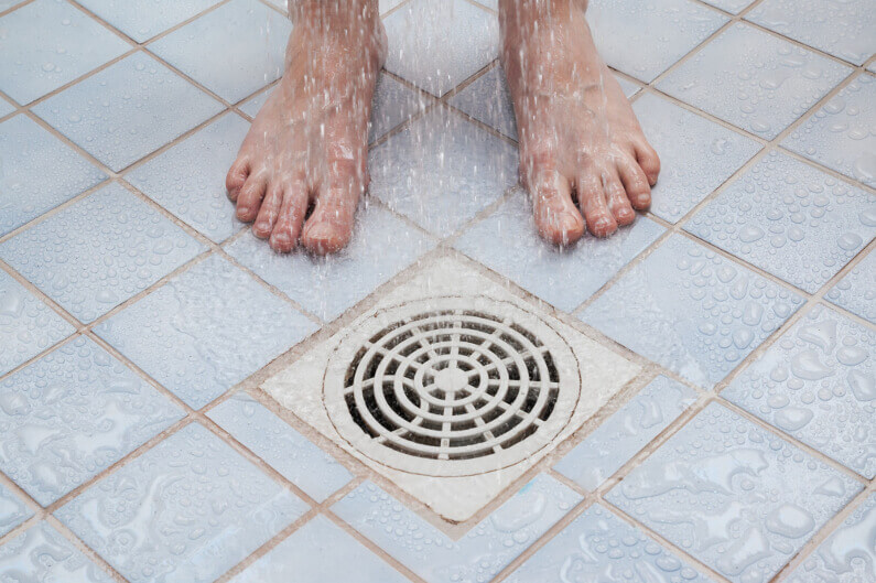 How to Fix a Slow-Draining Shower - Dengarden